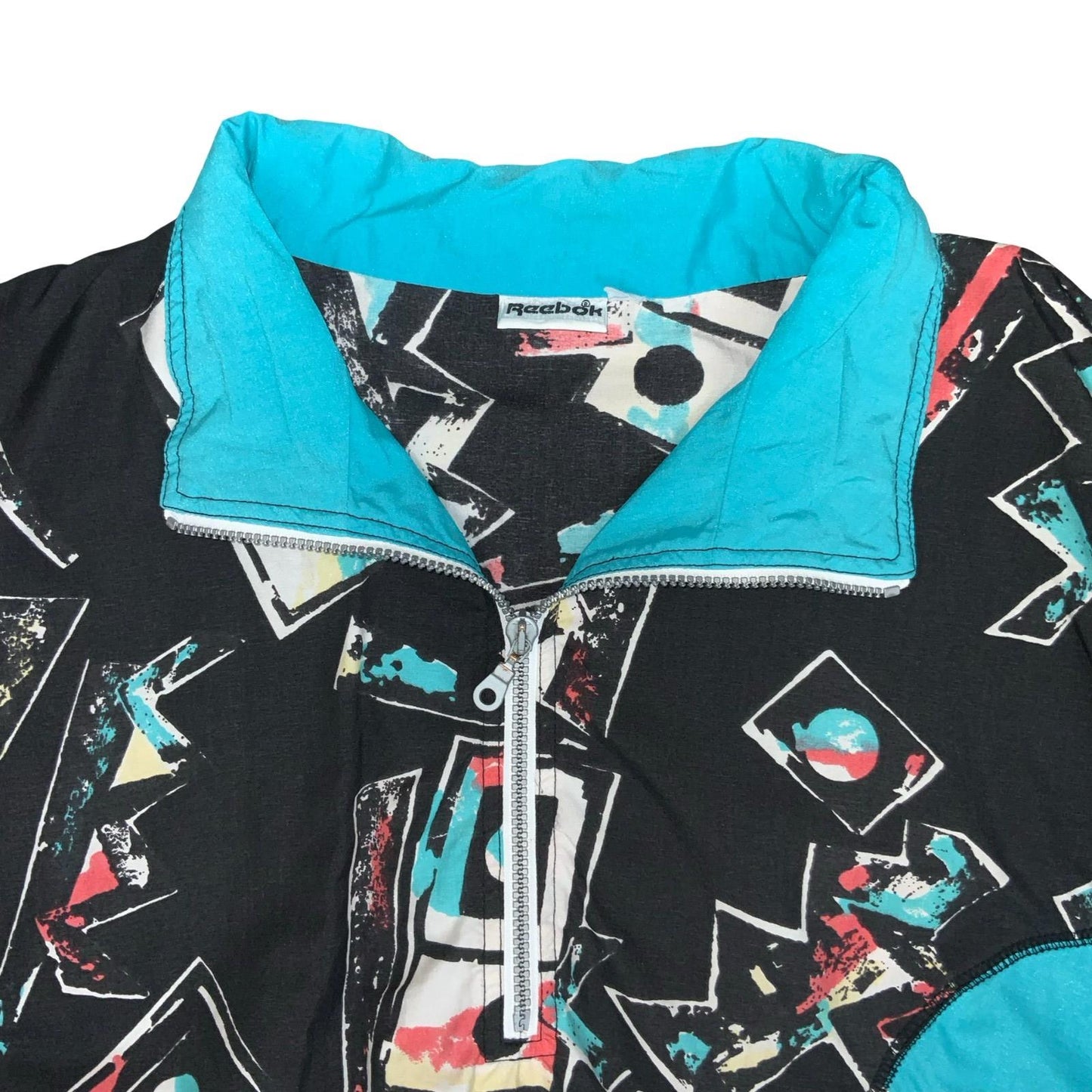 VTG 80s 90s 'REEBOK' 1/2 ZIP BLACK WHITE BLUE GEOMETRIC PULLOVER WINDBREAKER L