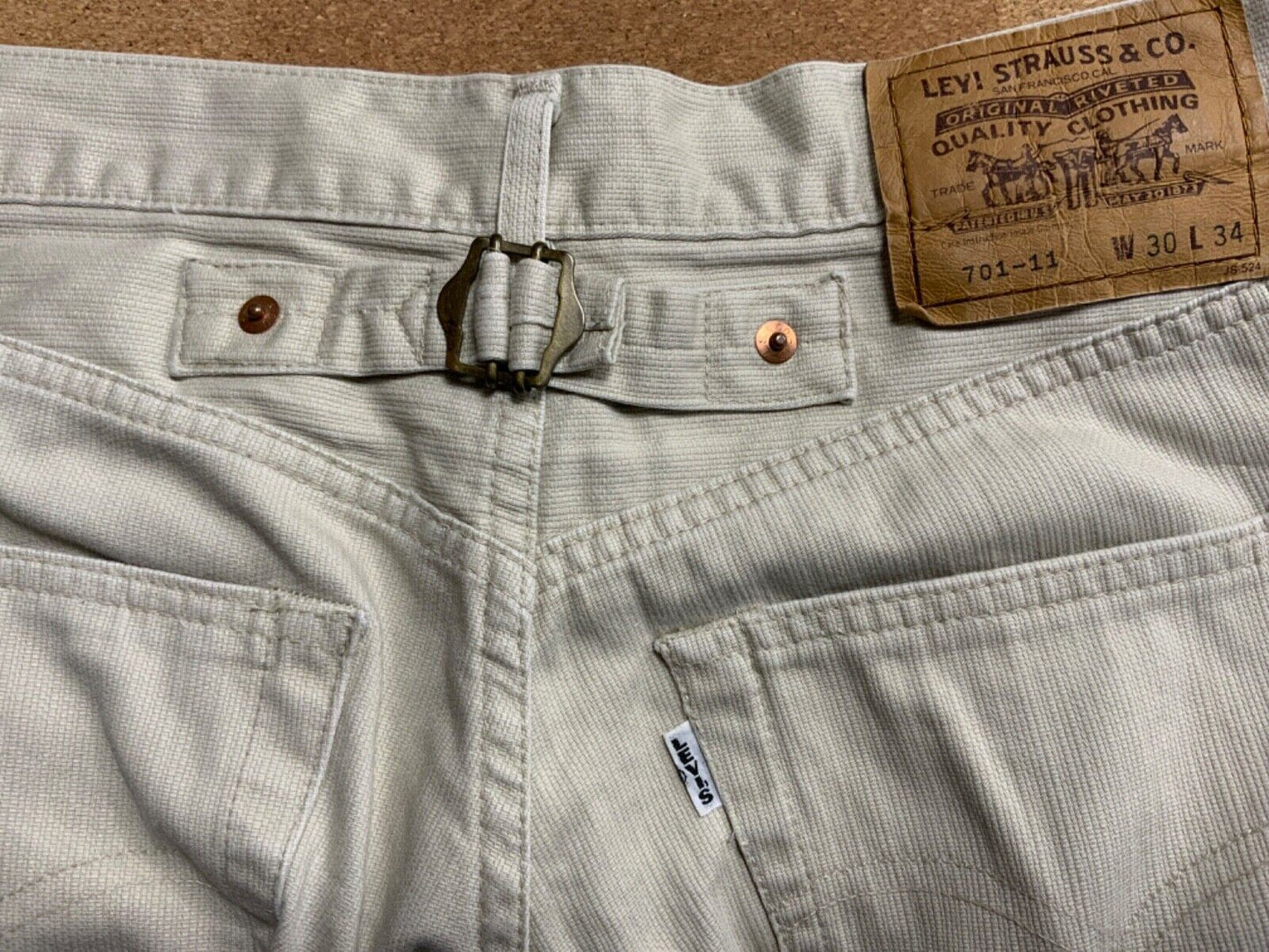 VTG 90s LEVIS 701-11 BIG E WHITE TAB CREAM CINCH RIBBED COTTON JEANS 29” W 33”L